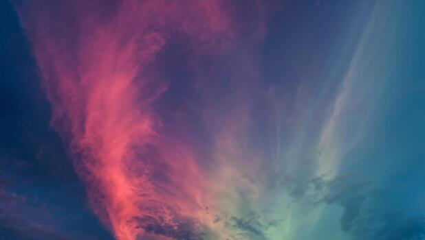 Vividly Colored Clouds at Dusk Creating Abstract Patterns photo