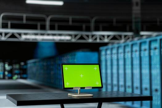 Isolated screen digital tablet in high tech data center used to troubleshoot hardware. Chroma key touchscreen device in server hub running software development tools, resolving system crashes photo