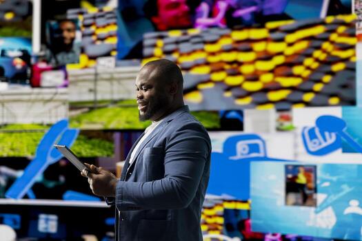 African american high tech guy exploring digital world through web platforms, reflecting trends in social media, sharing and user interface design within an immersive online environment. photo