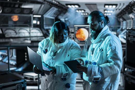 Astronauts in starship travelling to Mars navigating orbital trajectory using devices. Cosmonauts aboard orbit station ensuring operational readiness during cosmic journey to red planet photo