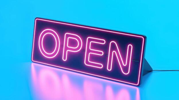 Neon Open Sign Glows Brightly Against a Vivid Turquoise Background photo