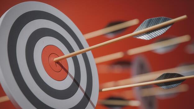 Arrow Hitting Target Bullseye With Multiple Attempts photo