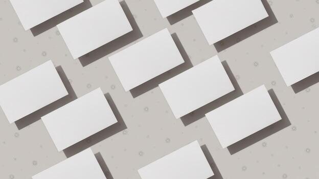 Many Blank Cards Are Arranged on a Light Grey Surface Casting Soft Shadows photo