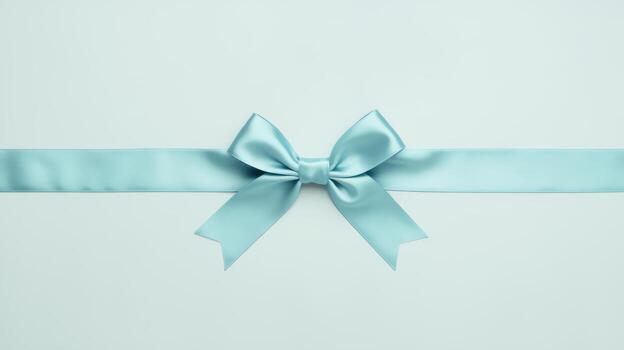 Soft Turquoise Ribbon With a Bow Placed Horizontally on White Background photo