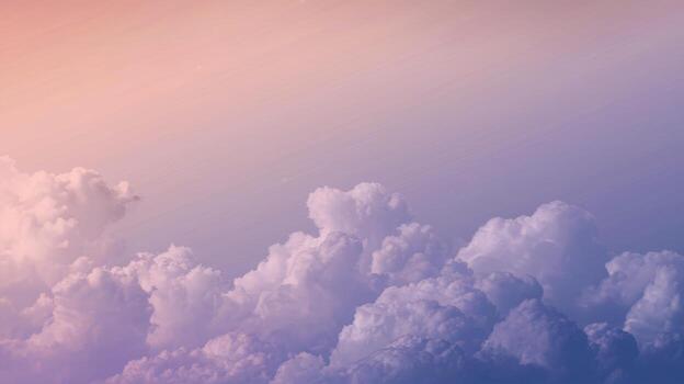 Cumulus Clouds Bathed in Sunlight Create Peaceful Sunset Scene photo