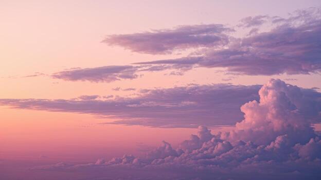 Beautiful Cotton Candy Sky at Sunset With Billowing Clouds in Soft Light photo