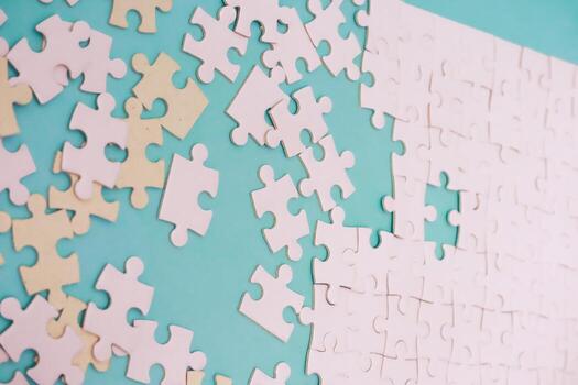 Conceptual image of completing a jigsaw puzzle depicts problem-solving challenges photo