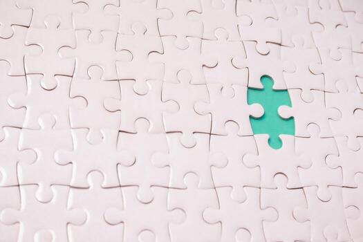 Concept of completing the puzzle shows solutions, strategy and success, focused on business and teamwork with the missing piece photo