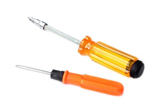 Two screwdrivers isolated on white background, one with a transparent yellow handle and the other with an orange handle, essential tools for repair, maintenance, construction, and DIY projects. photo