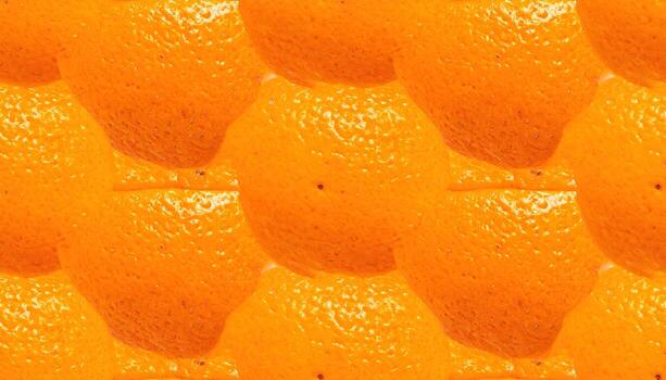 A close-up, repeating pattern of bright orange citrus fruits. Each has a textured skin and a slightly irregular, rounded shape, creating a visually dense, vibrant design photo