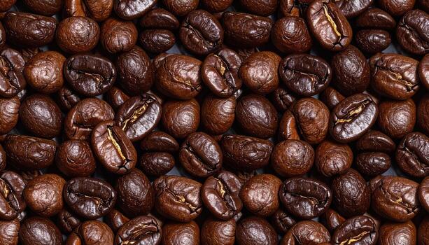 Close-up shot of roasted coffee beans, showcasing variations in color and texture, with intricate details visible, filling the frame. Light reflects on the smooth surfaces photo