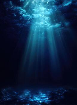Underwater light rays pierce dark depths photo