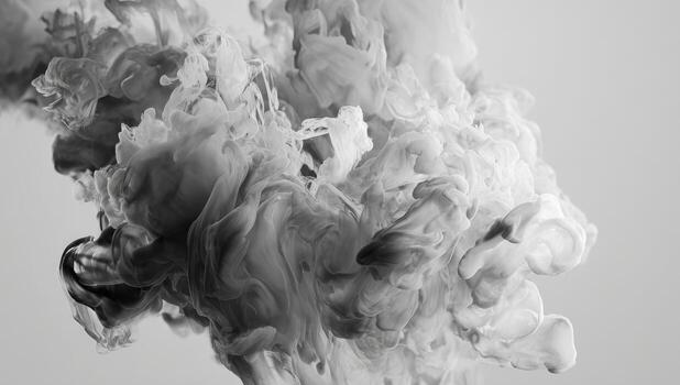 A black and white photo of ink being sprayed into water