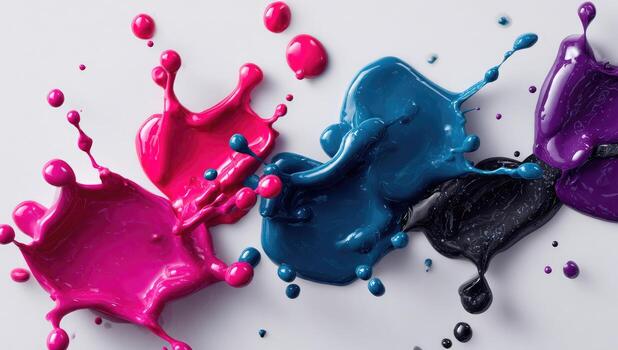Colorful ink splashes on white background photo