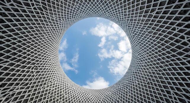 Modern Architecture Abstract Looking Up Through Geometric Lattice to Cloudy Sky, upskirt view photo