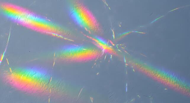 Abstract Rainbow Light Refraction and Diffraction Patterns on a Cloudy Sky Background Bokeh Effect photo