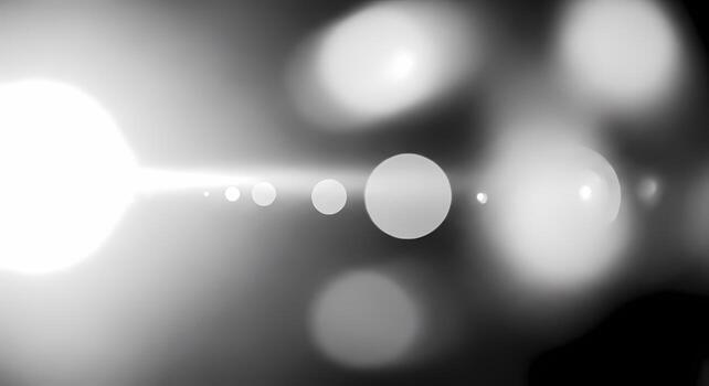 Bright Lens Flare with Bokeh Effect Overlay Abstract Light Streaks and Circles on Dark Background photo