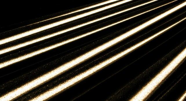 Abstract Background of Parallel Golden Light Streaks on Textured Dark Surface Modern Design Element photo