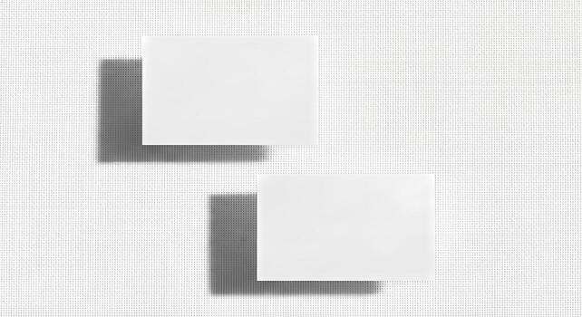 Two blank white squares creating shadow effect on textured background, copy space, overhead photo