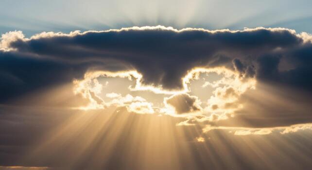 The sun shines through the clouds in this photo