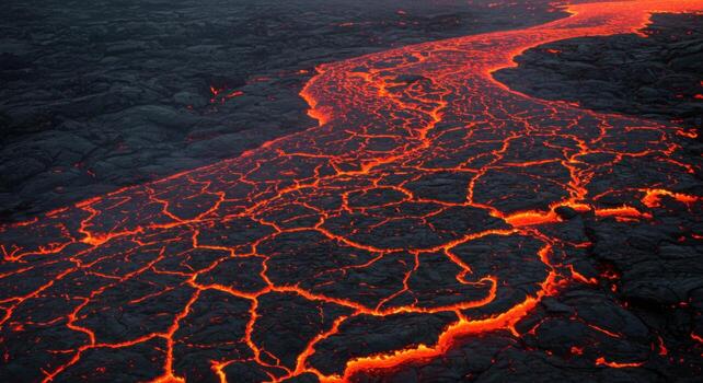 The lava flows from the volcano in the middle of the ocean photo
