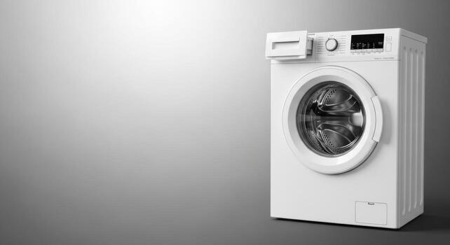 A white washing machine on a gray background photo