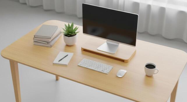 A desk with a computer, keyboard, mouse and coffee cup photo