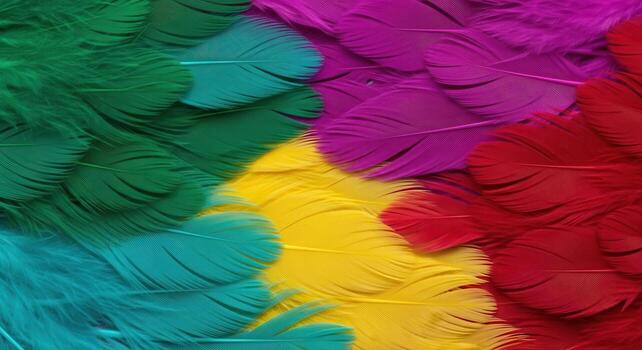 Vibrant textured background of overlapping colorful feathers in green, yellow, red, and magenta photo