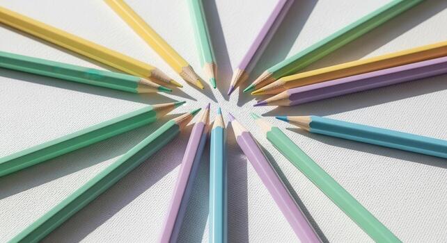 Pastel colored pencils arranged in a star pattern, symbolizing creativity and art photo