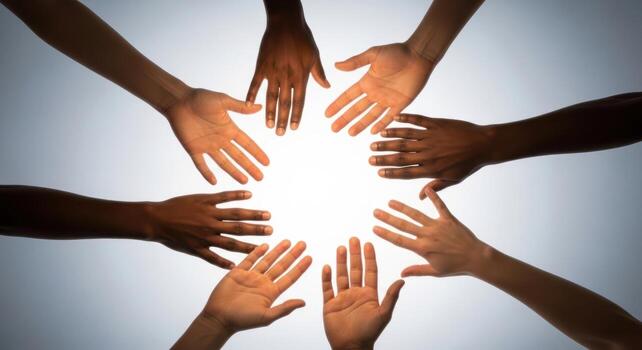 Seven diverse human hands forming a circle, symbolizing unity, collaboration, and inclusion. photo