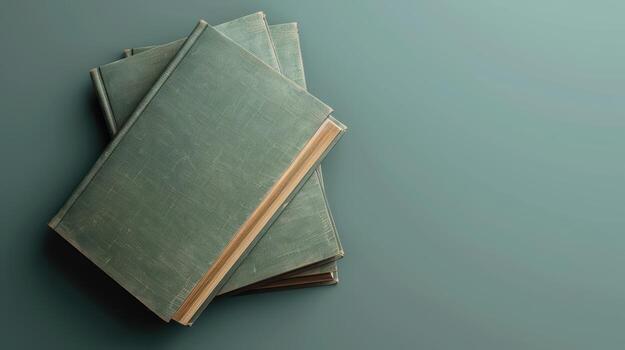 Old books on a blue background photo