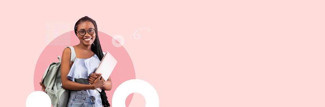 A student stands confidently with a backpack and notebook, embodying enthusiasm for learning in a modern educational setting. The soft pink background adds a creative touch. photo