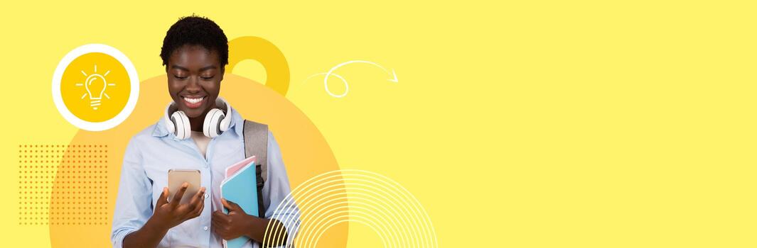 A college student smiles while using a smartphone and holding notebooks. The background features a cheerful yellow tone, symbolizing optimism in the new normal of education. photo