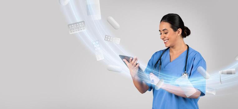 A doctor smiles while using a smartphone, surrounded by floating medication and pill imagery. The setting emphasizes innovation in healthcare and the importance of technology in medicine. photo