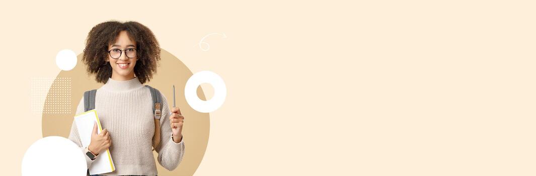 A student with curly hair and glasses holds a notebook and pen while wearing a cozy sweater. The modern school background features soft colors, creating an inviting learning atmosphere. photo