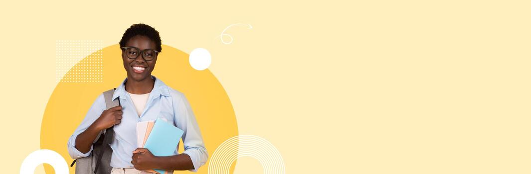 A smiling student stands with notebooks and folders, dressed casually in a modern educational environment. The background features vibrant colors, creating an inspiring atmosphere for learning. photo