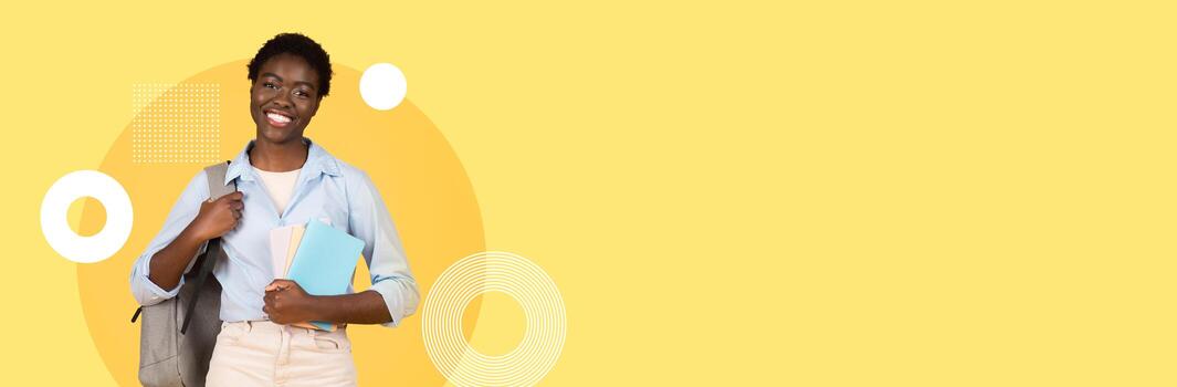 A student stands confidently with a backpack and books, showcasing enthusiasm for learning. The modern school environment is vibrant, with a cheerful yellow background adding a bright touch. photo