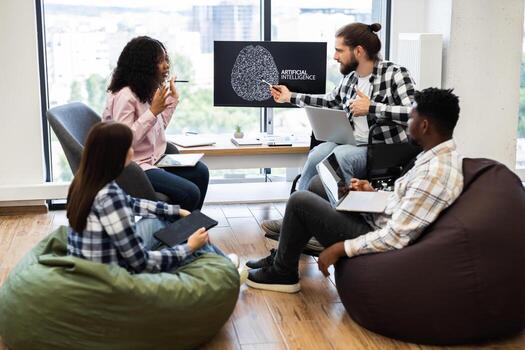 Young professionals brainstorming on artificial intelligence project. Workplace includes diverse team, casual setting, modern technology, relaxed collaborative atmosphere photo