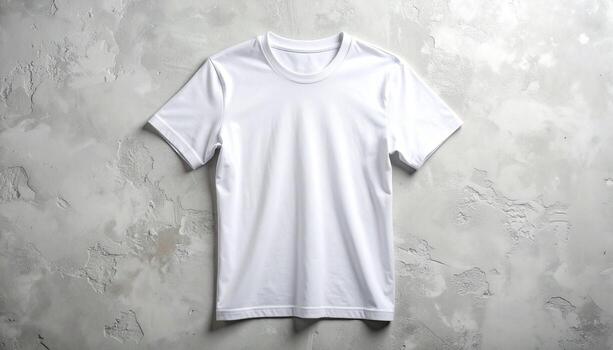 Plain white tshirt on a textured gray background casual apparel. photo