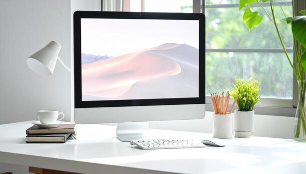 Modern workspace with computer plants and natural light for productivity. photo