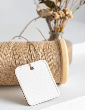 Rustic Charm Twine Tag and Dried Flowers Still Life. photo