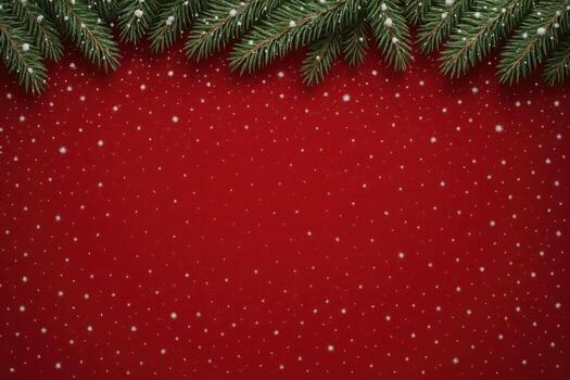 Festive Christmas background with fir branches and snow on a red surface. photo