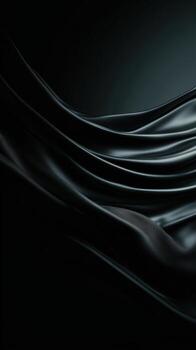 Glossy black curves flowing in a wave-like pattern across a minimalist abstract scene photo