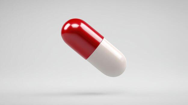 rojo y blanco cápsula píldora en un llanura antecedentes. símbolo de cuidado de la salud y medicación foto