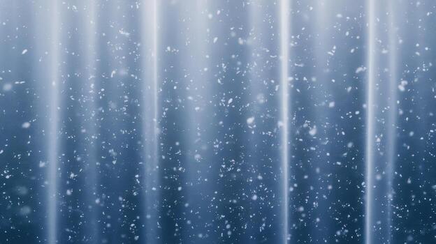 Falling Snow With Illuminated Vertical Light Beams on a Cold Winter Day photo