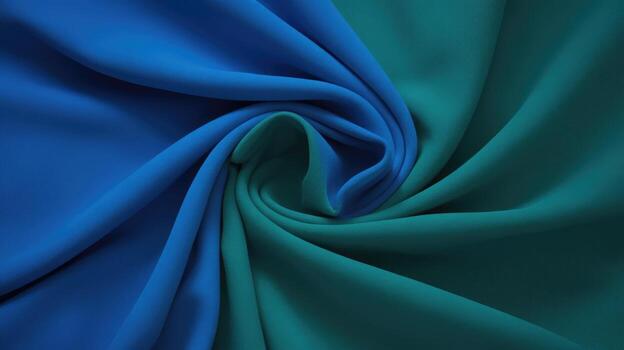 Blue and Green Fabric Spiraling Creating a Vibrant Texture photo