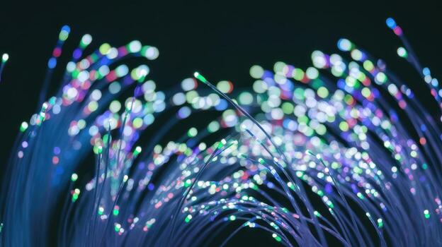 Abstract Fiber Optic Cables Glow With Colorful Lights Against a Dark Background photo