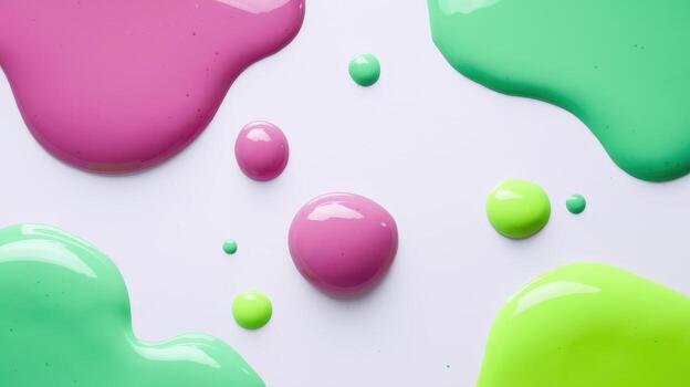 Pink and Green Paint Blobs and Drops on a White Surface photo