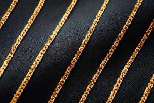 Golden chains creating diagonal pattern on dark background photo