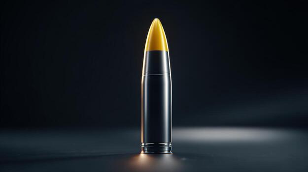 A close-up shot of a shiny bullet with a bright yellow tip, set against a dark background, highlighting its sleek design. photo